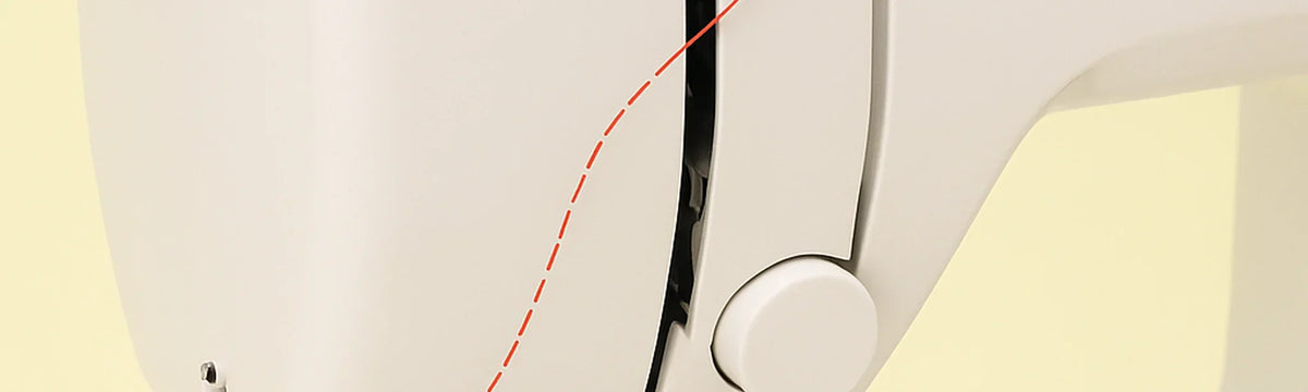 Threading a sewing machine