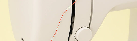 Threading a sewing machine